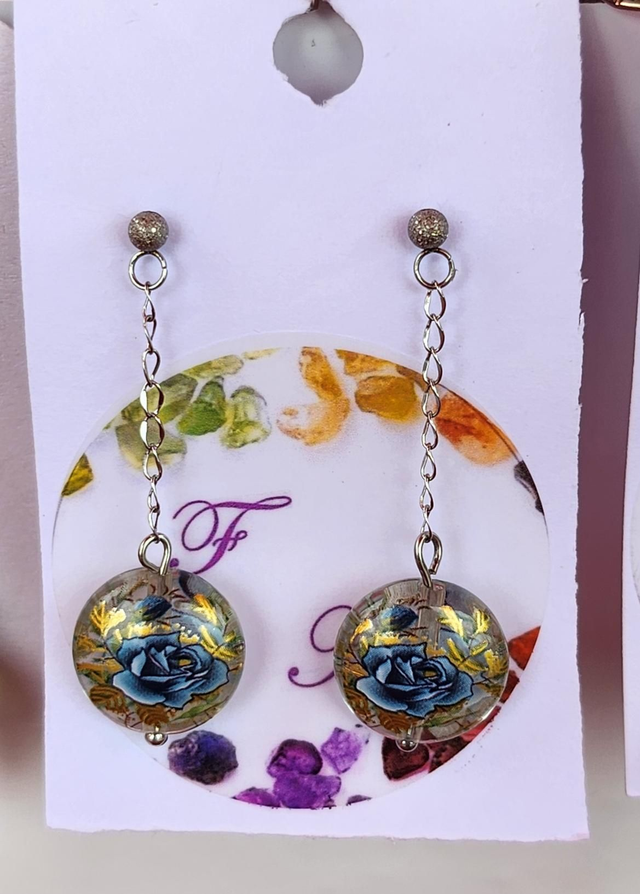 Boucle d’oreille fleur bleu