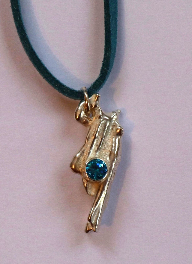 Silver Pendant with Blue Cubic Zirconia – Spaghetti-Cast Texture