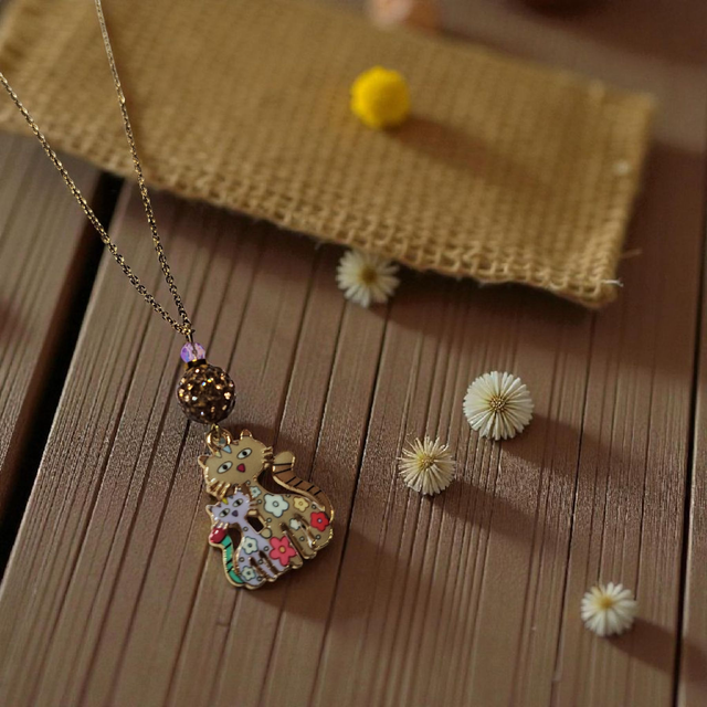 Collier acier inoxydable et cristal brun et parme chats