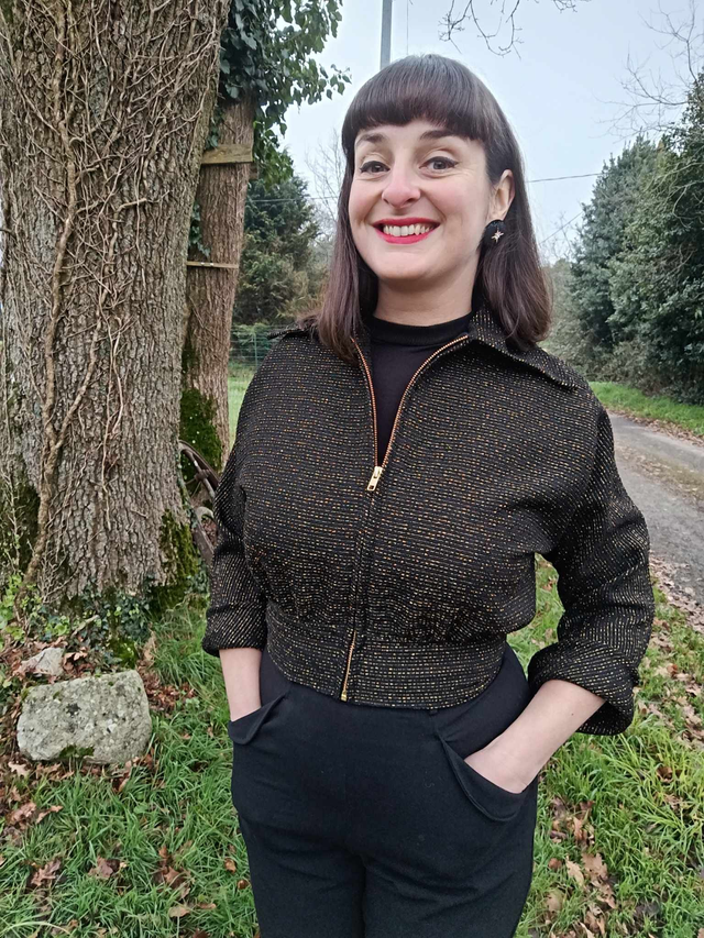 Veste topper lurex doré et noir