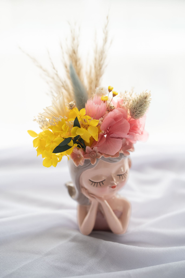 Mini poupée fleurie