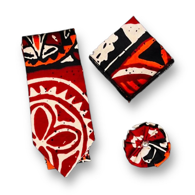 Cravate, mouchoir de poche et pins