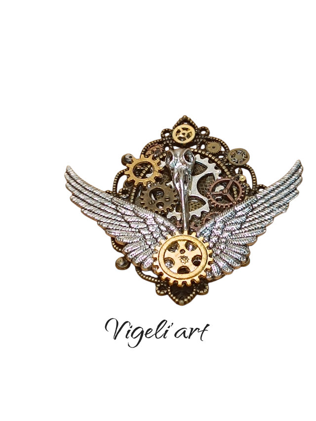 Broche ovale crâne d'oiseaux 