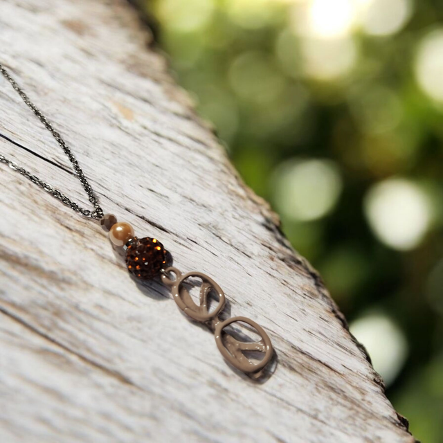 Collier acier inoxydable et cristal brun lunettes