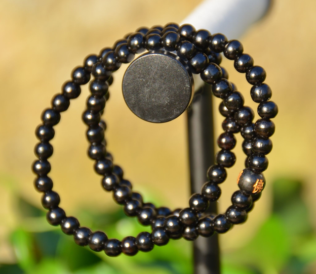 Mala bois imitation bois d&#039;ébène élastique noir