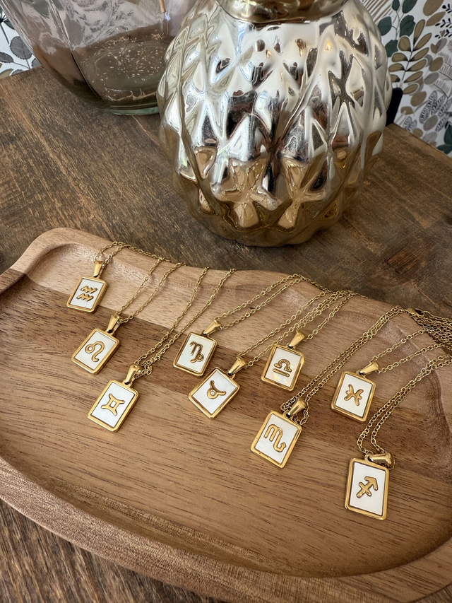 Colliers Signes Astro Nacre &amp; inox couleur dorée - Au choix