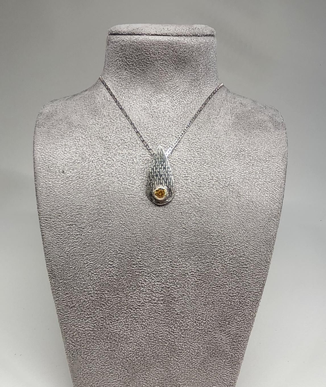 Teardrop with citerine cubic zirconia fine silver pendant