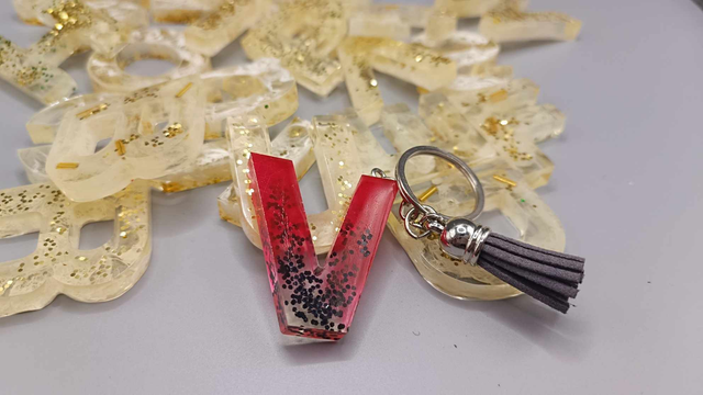 Porte clé Lettre avec pompon