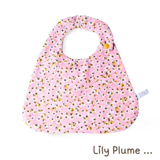 Bavoir pression rose fleurs jaunes