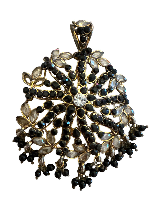 Ciondolo vintage con pietre bianche e nere