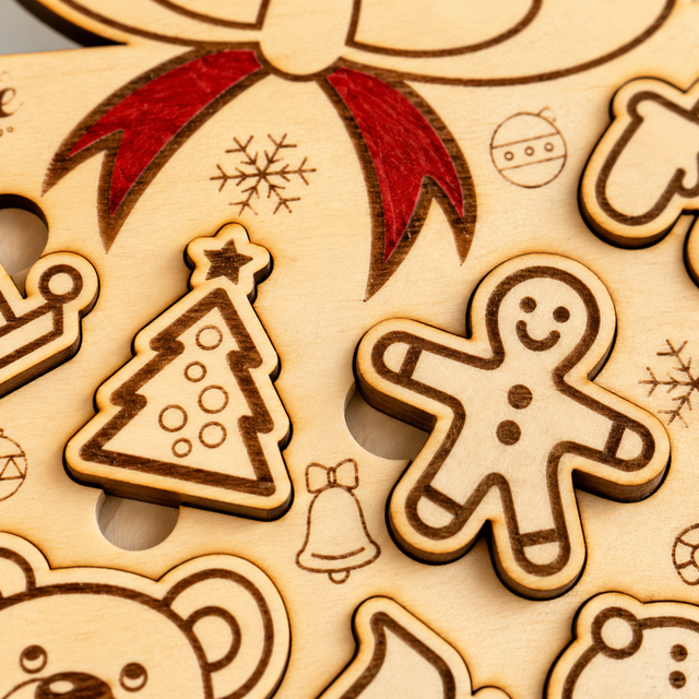 Puzzle natalizio a pacco regalo in legno – gioco per le feste
