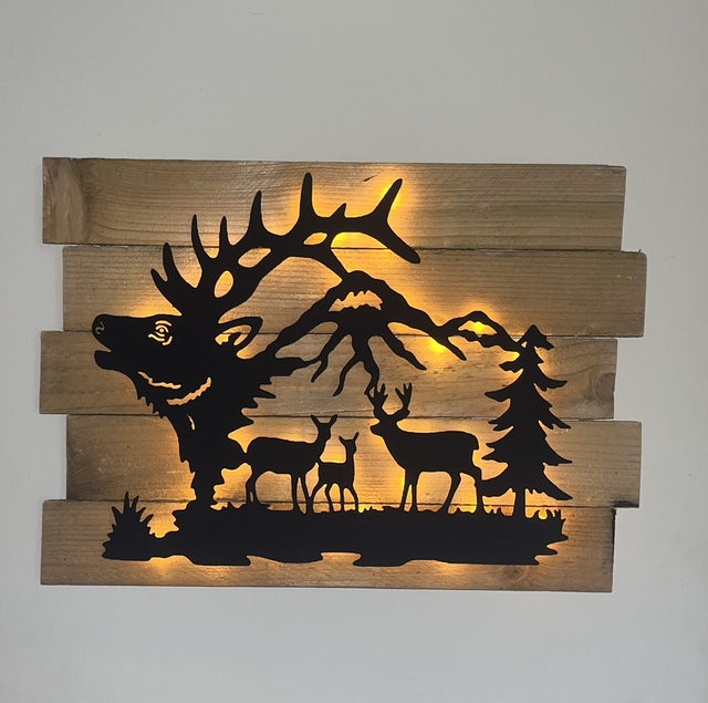 Cadre lumineux cerfs paysage 