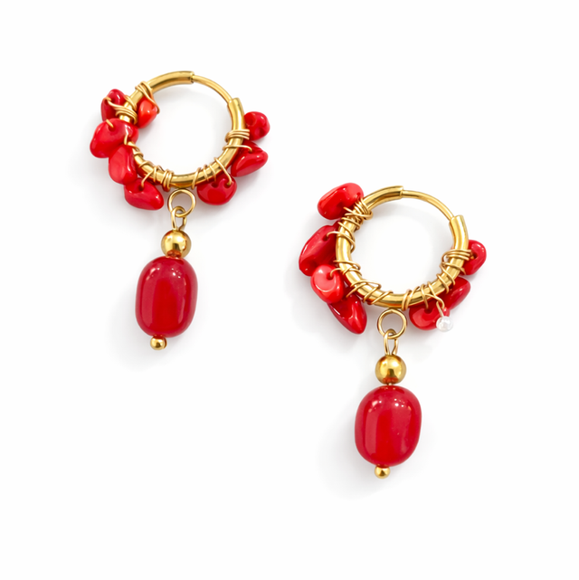 Argollas acero dorado piedras rojas 