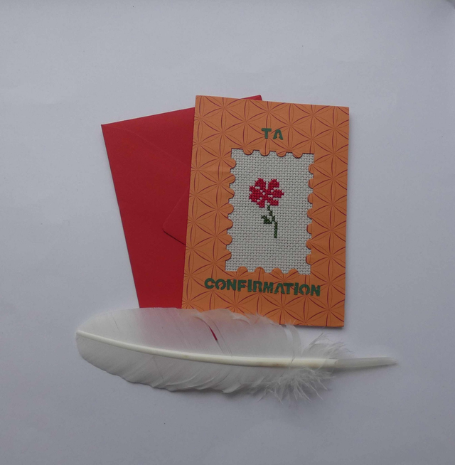 La fleur brodée de confirmation