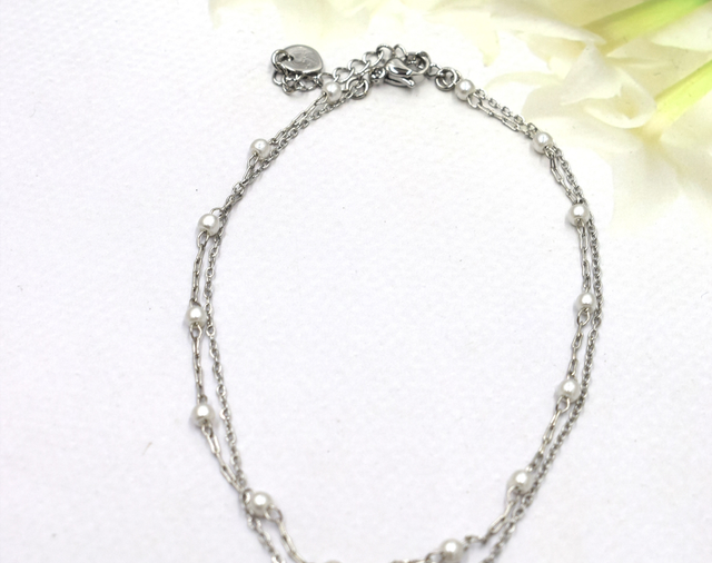 Chaîne de cheville double plume