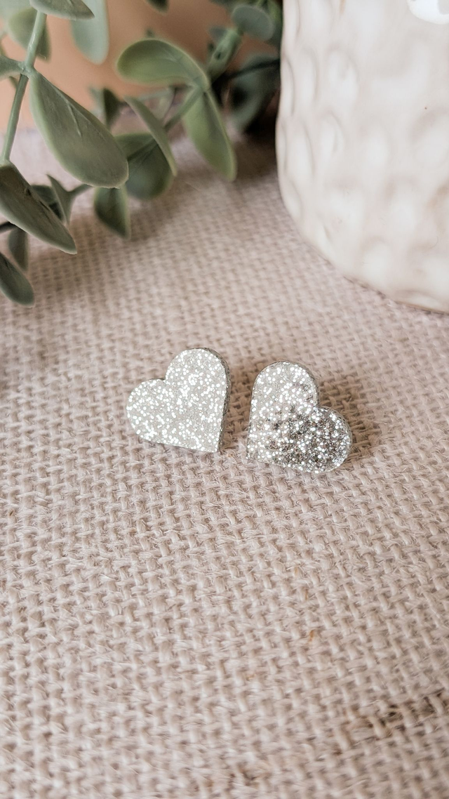 Petites boucles coeurs argentés pailletés