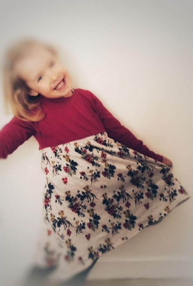 La robe qui tourne à manches longues sur mesure .