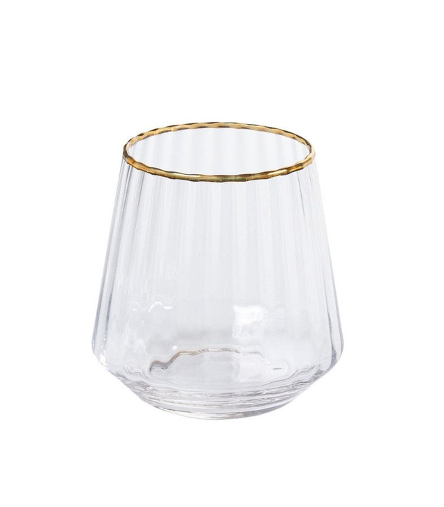 Juomalasi kullanvärisellä reunalla