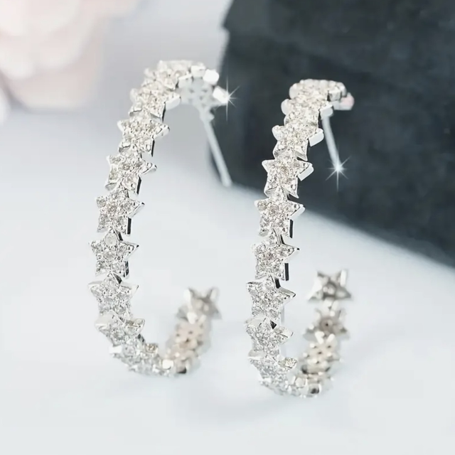 Large sparkling star hoop earrings