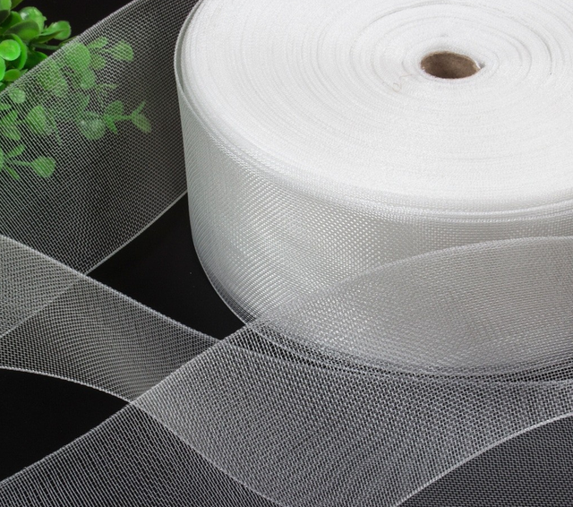 Huismerk: Stof- transparant gordijnband