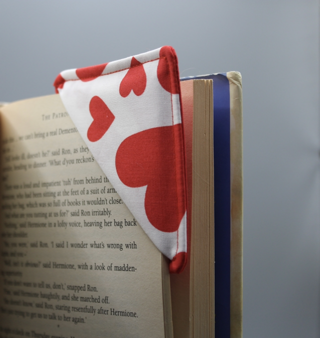 White with red hearts book corner