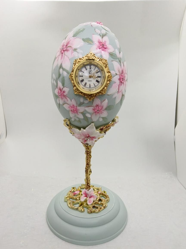 Hand painted Rhea egg Clock with Enamelled stand 