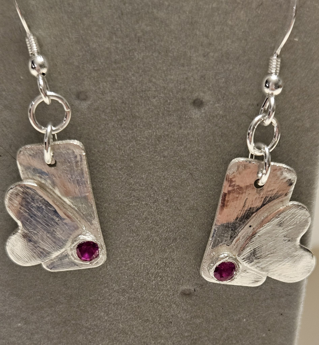 Silver envelopes with hearts and fuschia cubic zirconias