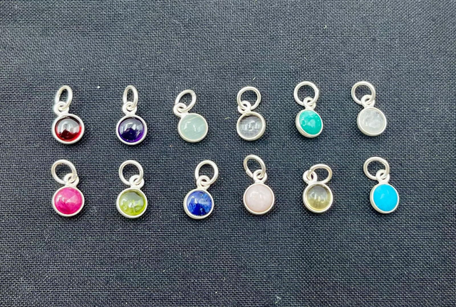 1 birthstone on a Sterling Silver Link Charm Bracelet