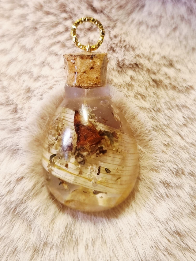 Le Pendentif Potion #52 - Joie