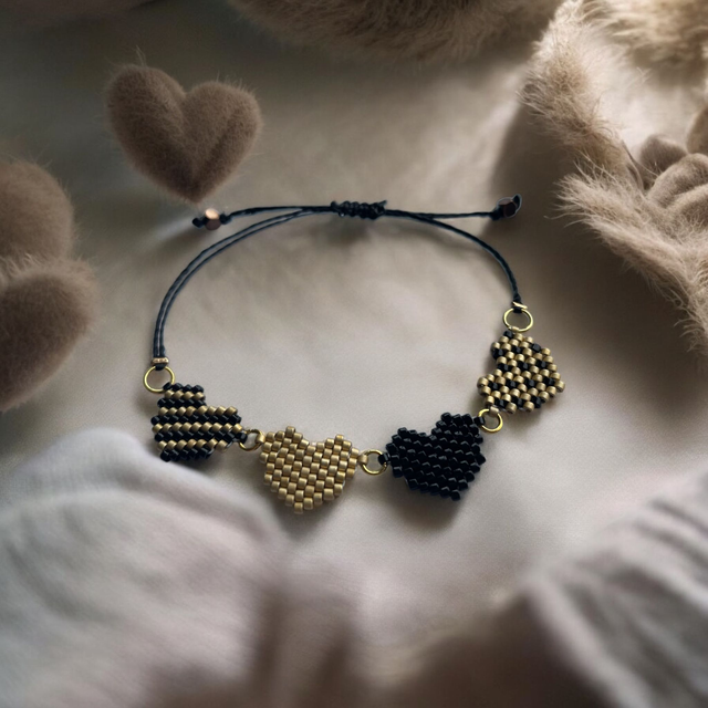 Bracelet 4 coeurs noir et doré