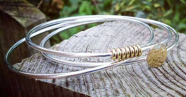 Sterling silver and brass mixed metal bangle stack