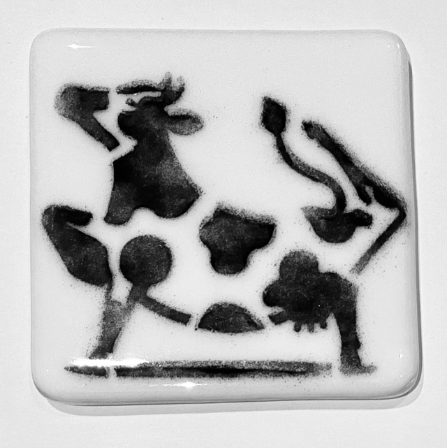 Dancing cow coaster