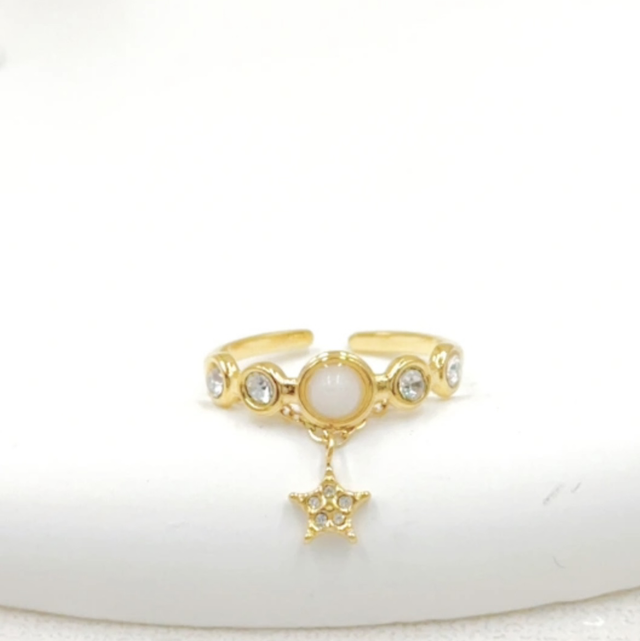 Bague pierre blanche avec chaîne 