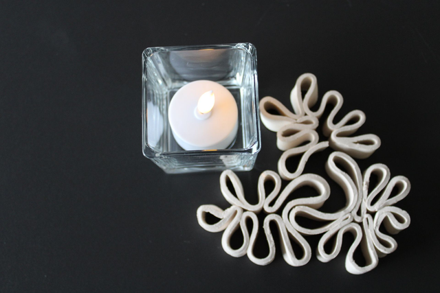 Tafelversiering 3 tafelkrullen met theelichthouder en kaars