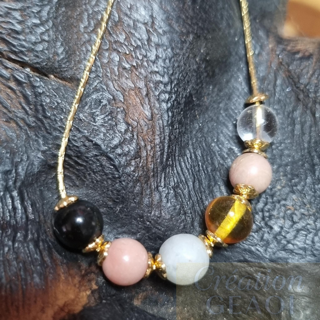 Bracelet des êtres chers (obsidienne noire, Opale Rose, emeraude, ambre,rhodocrosite, cristal de roche