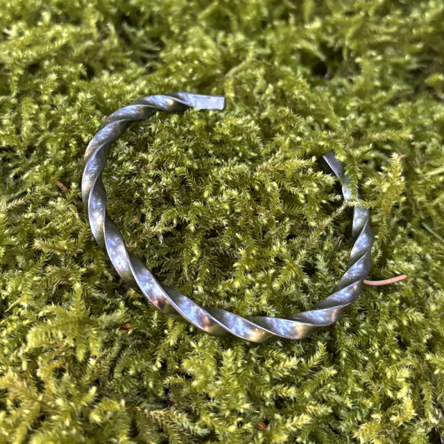 Manchette torsade homme