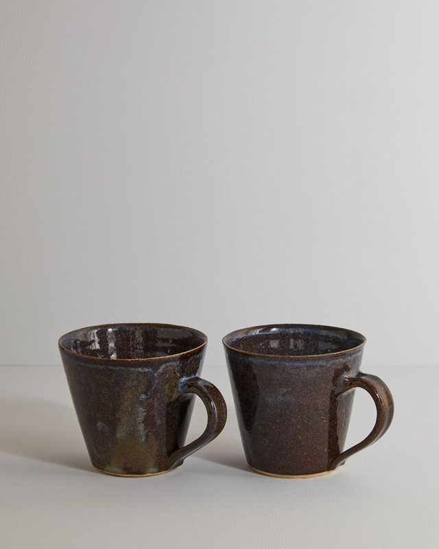 A pair of blue mist mugs