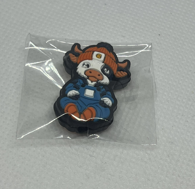 Okse med klær Maskestopper