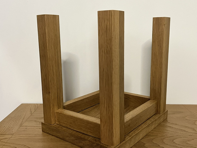 Two rustic low stools made of American Oak.