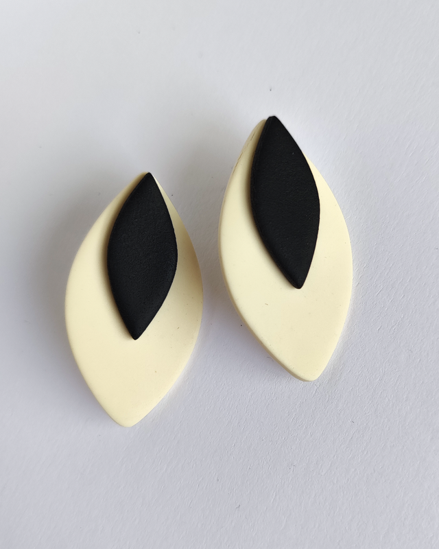 Candela beige y negros