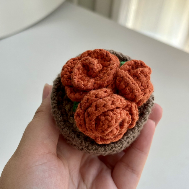 Pot de fleurs orange