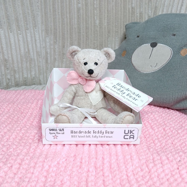 *No name* traditional beige bear. Baby pink bow tie. Small size, handmade teddy bear. UKCA. Tray base. Standard Wool Felt. Beige. Cream. 