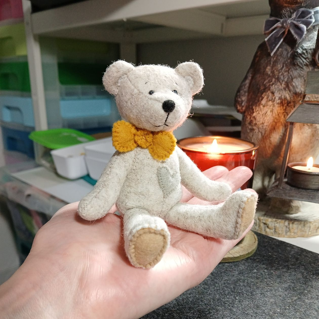 Prince. Miniature size, handmade teddy bear. UKCA. Tray base packaging. Standard Wool Felt. Beige. Mustard. Grey. Sand.