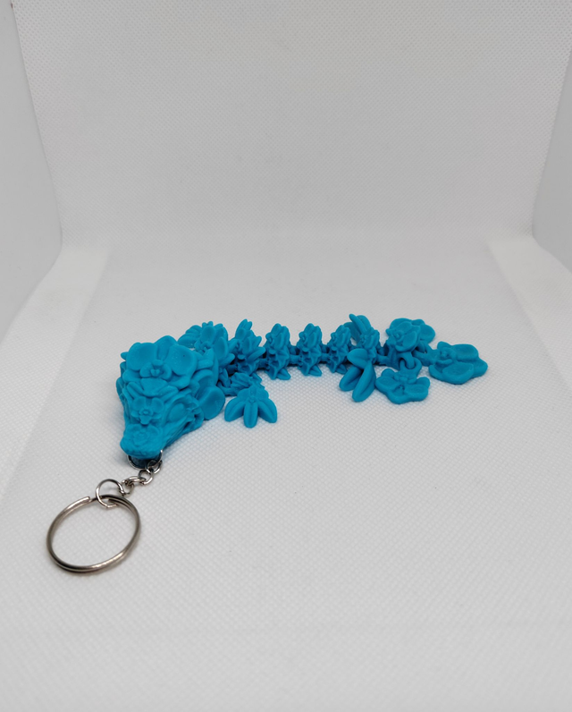 Porte-clés dragon fleurs d'orchidée