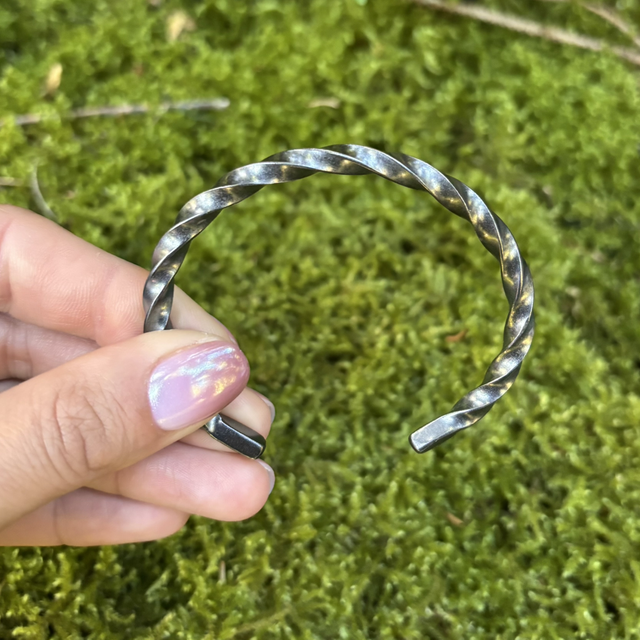 Manchette torsade homme