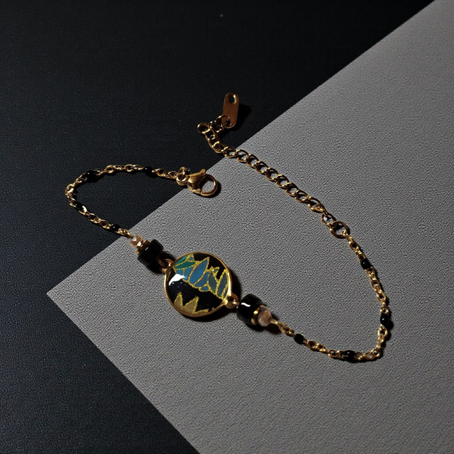bracelet acier inoxydable motifs japonais noir bleu et doré