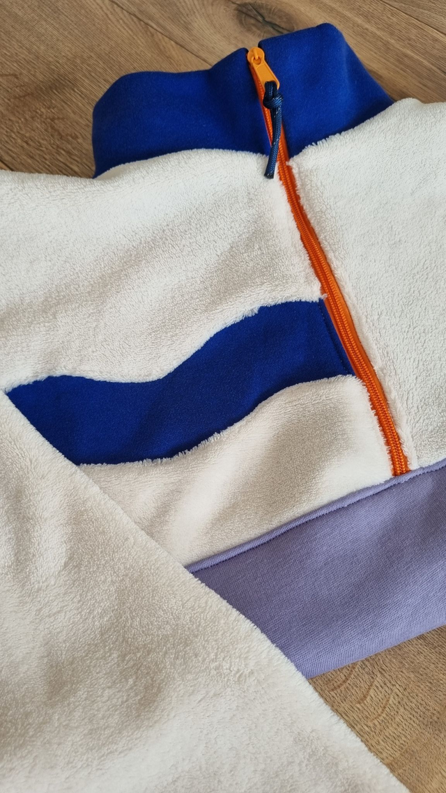 Pull polaire beige, lilas, bleu