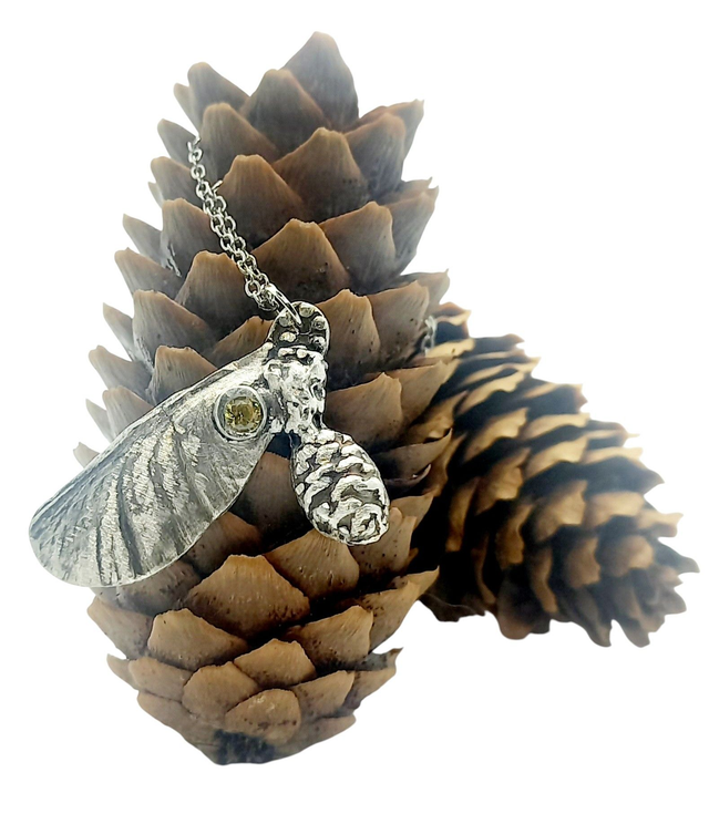 Pine cone and a sycamore leaf silver pendant