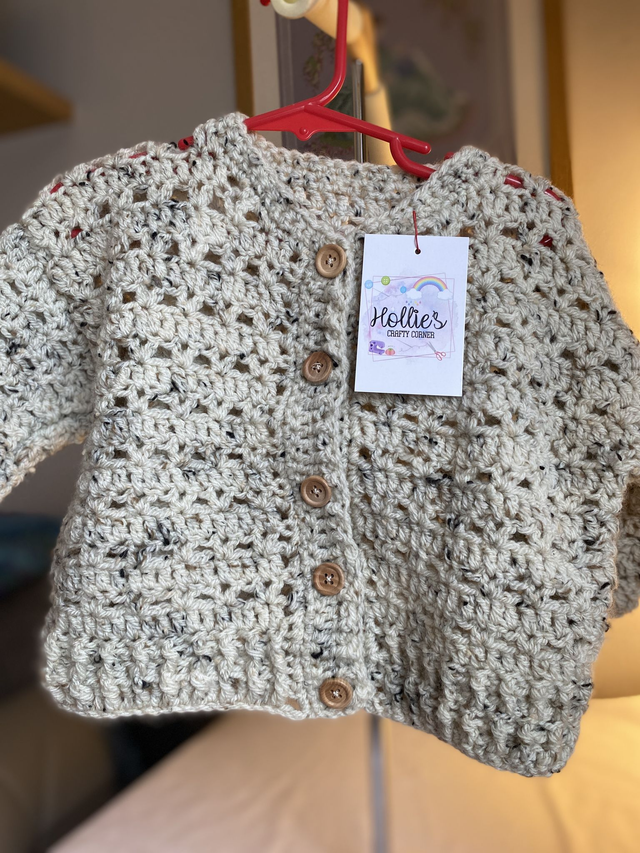 G9. Beige cardigan. 30 inch chest