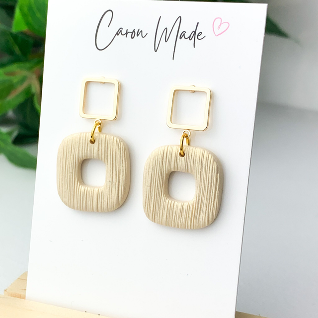 Neutral light gold square earrings with 18kt gold posts